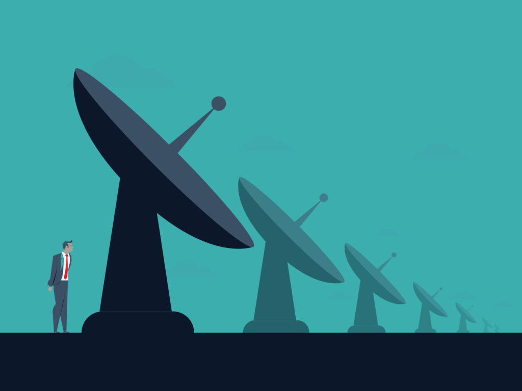 A brand image from The Cyber Scheme depicting a man looking at satellite dishes
